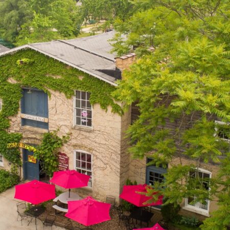 Cedarcreekwinery Tour Ivy Covered Building Patio Red Umbrellas