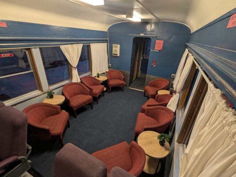 cooperstownandcharlottevalleyrailroad_tour-train-lounge-red-chairs-tables Cooperstownandcharlottevalleyrailroad Tour Train Lounge Red Chairs Tables