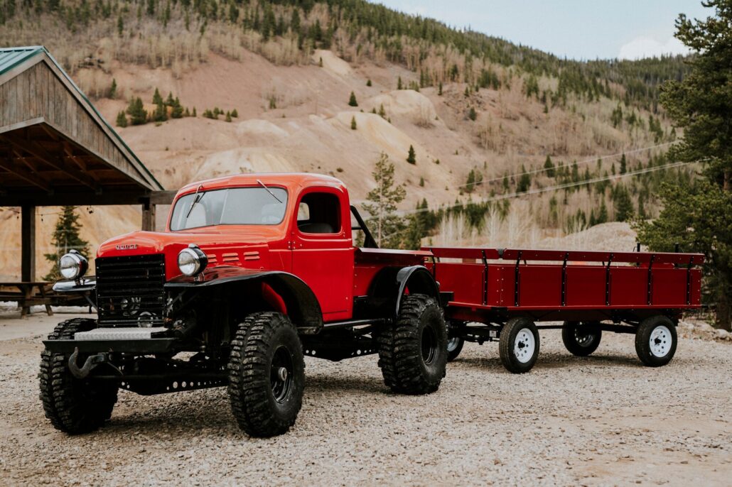 Countryboymine Tour Red Truck Wagon Mountain Background