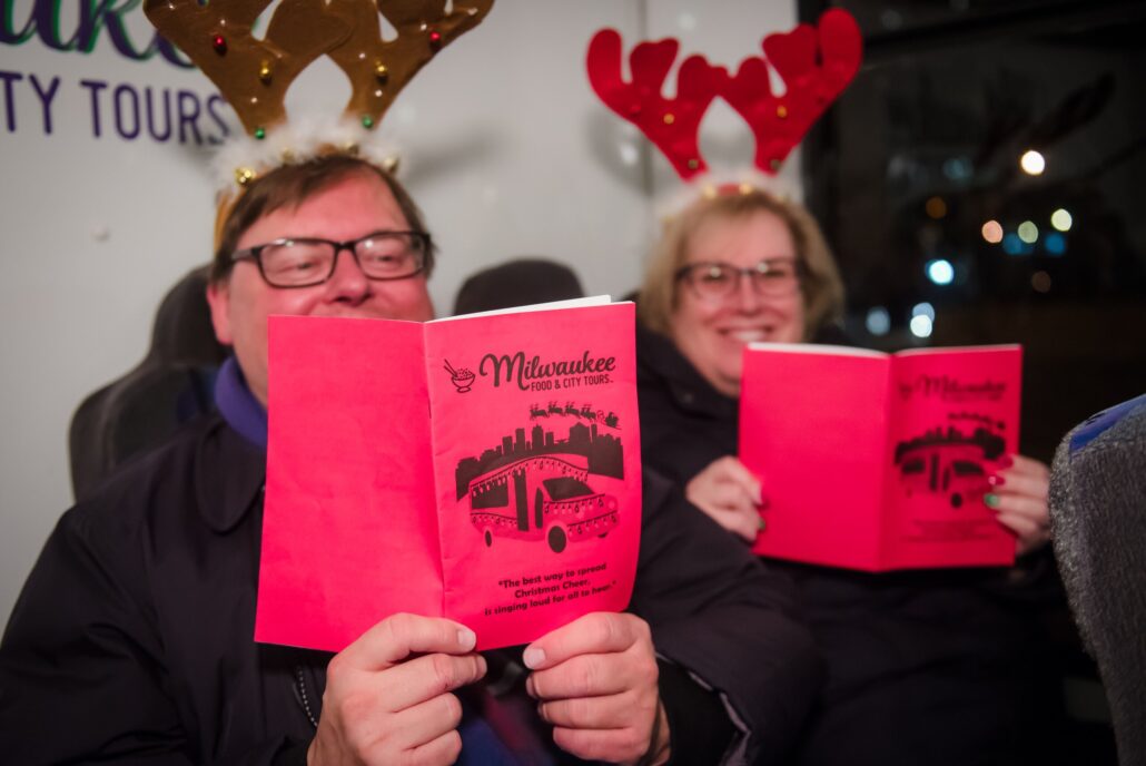 Milwaukeecitytours Tour Tourists Christmas Hats Reading