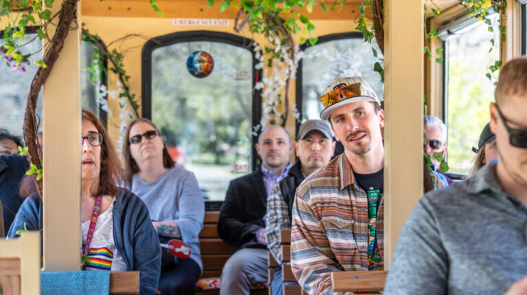 minneapolistrolleytours_tour-passengers-trolley-ride-interior Minneapolistrolleytours Tour Passengers Trolley Ride Interior