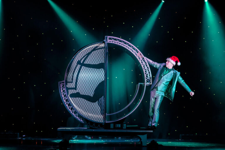 Mountainofentertainmenttheater Tour Magician Stage Performance Santa Hat