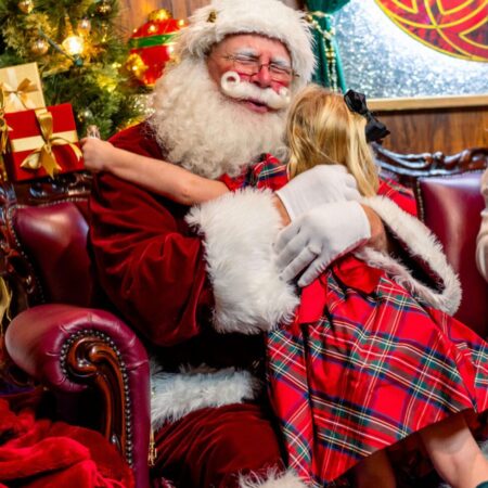 Onceuponanisland Christmas Tour Santa Claus Girl Hugging Christmas