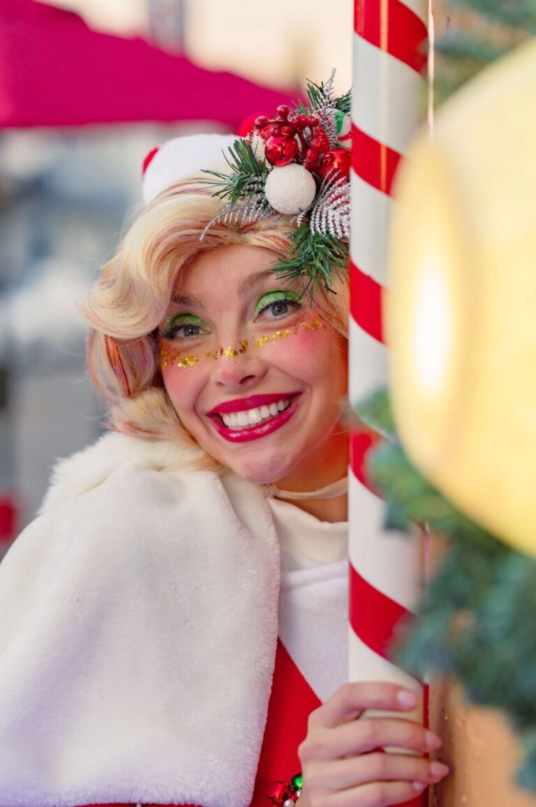 onceuponanisland-christmas_tour-smiling-woman-holiday-costume-candy-cane Onceuponanisland Christmas Tour Smiling Woman Holiday Costume Candy Cane