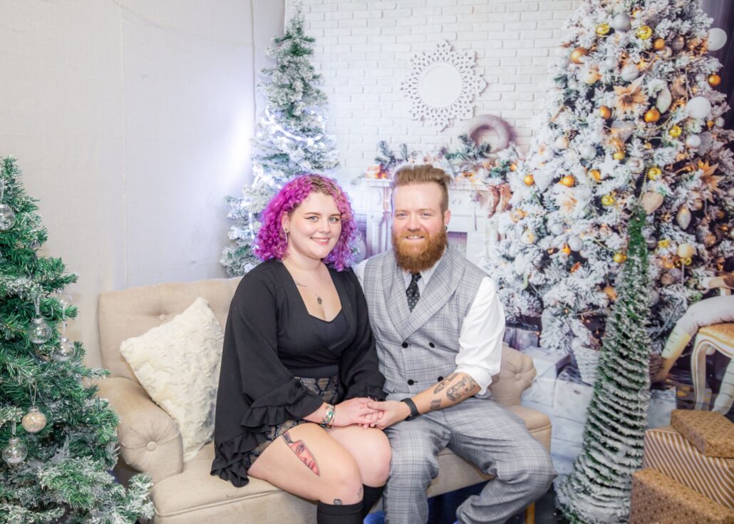 pictureprojectclt_tour-couple-christmas-trees-photobooth Pictureprojectclt Tour Couple Christmas Trees Photobooth