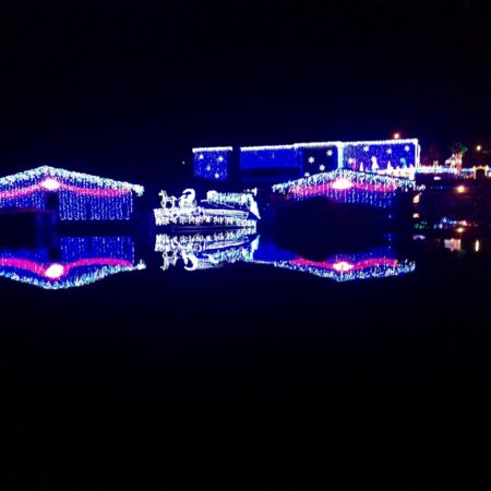 Rustyanchormountdora Tour Decorated Houses Water Reflection Lights