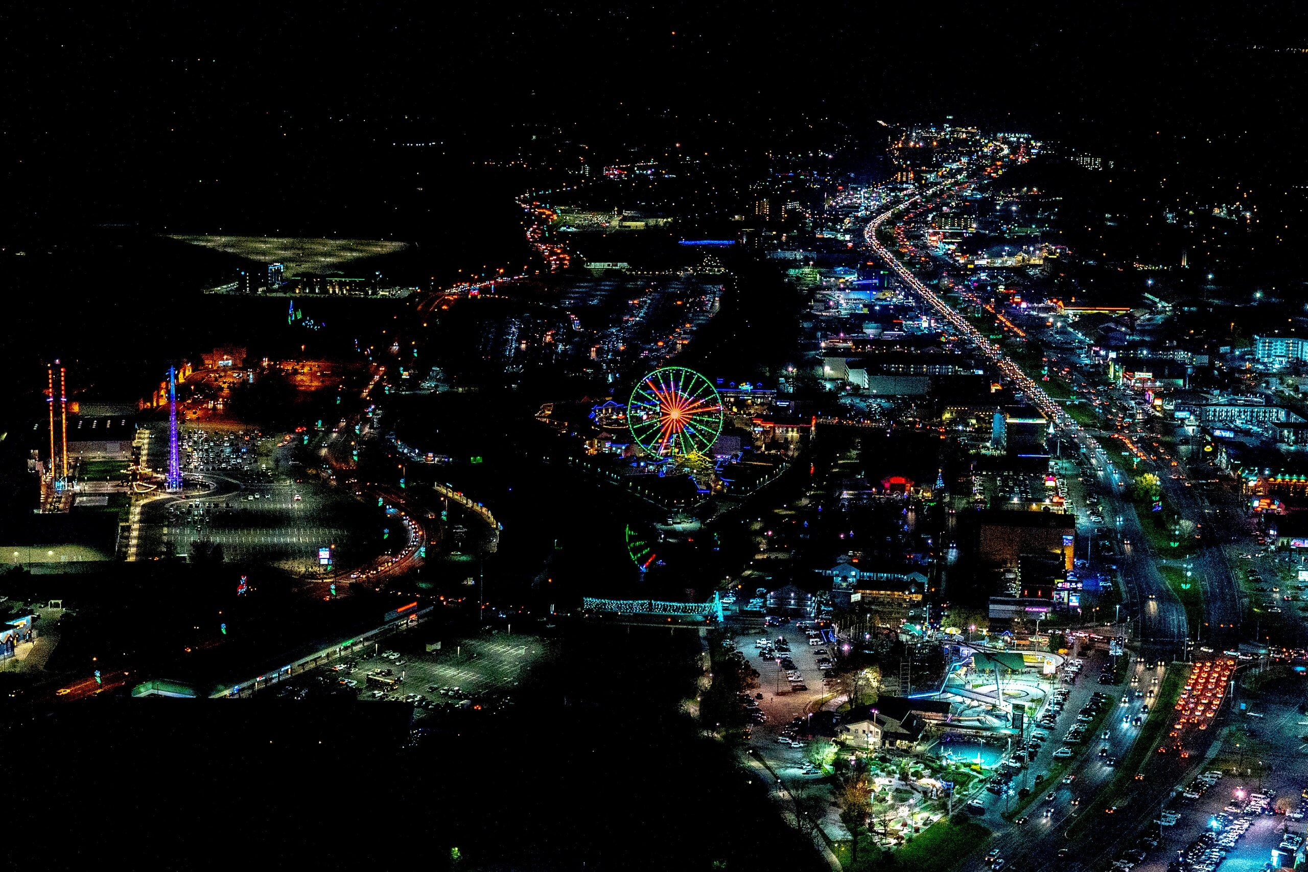 Scenichelicoptertours Tour Night Aerial View Ferris Wheel City Lights