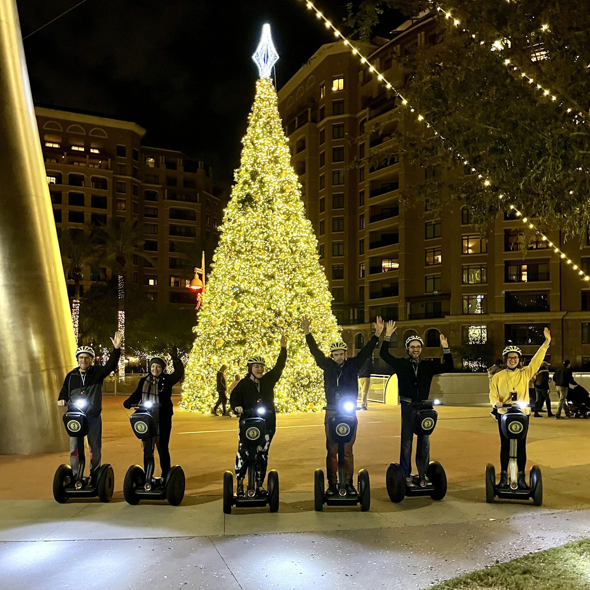 scottsdalesegwaytours_tour-segway-riders-christmas-tree-night Scottsdalesegwaytours Tour Segway Riders Christmas Tree Night