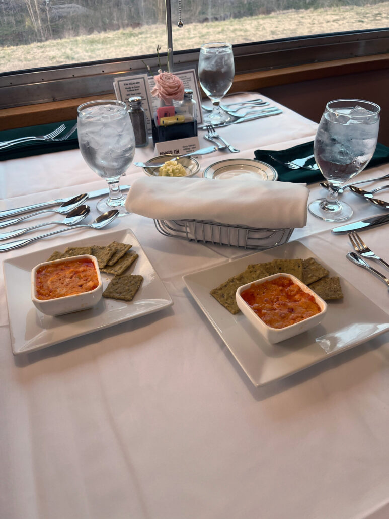 tvrail_tour-dining-table-soup-crackers-water Tvrail Tour Dining Table Soup Crackers Water