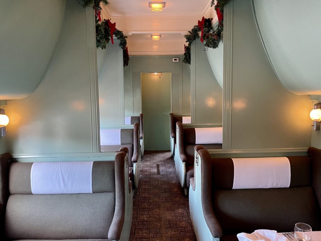 tvrail_tour-train-interior-cozy-seating-holiday-decor Tvrail Tour Train Interior Cozy Seating Holiday Decor