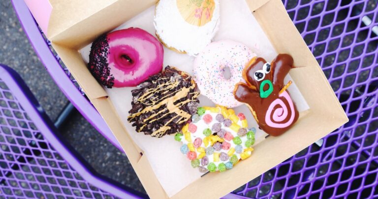undergrounddonutour_tour-colorful-donuts-box-purple-table Undergrounddonutour Tour Colorful Donuts Box Purple Table
