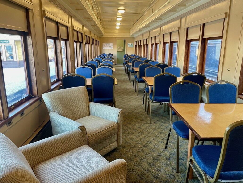 Woodstowncentral Tour Train Interior Blue Chairs Tables