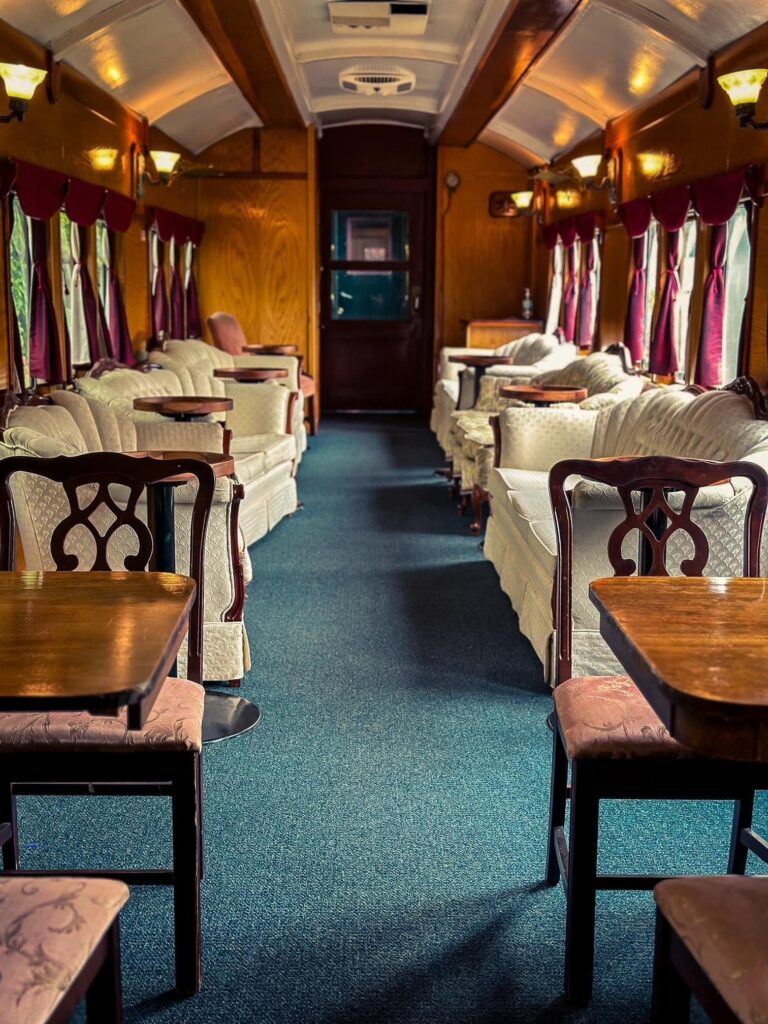Wsrr Tour Train Interior Upholstered Seating Wooden Tables